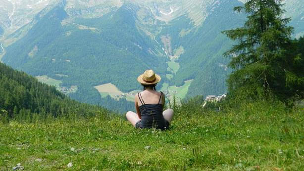 Mountains with girl looking off